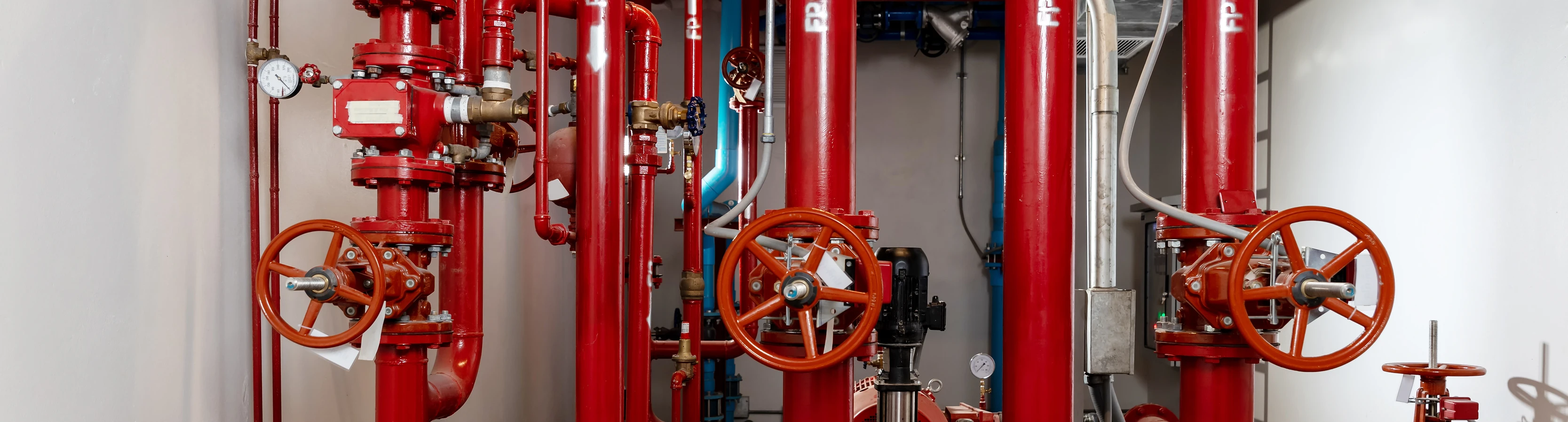 water pipes in a white room